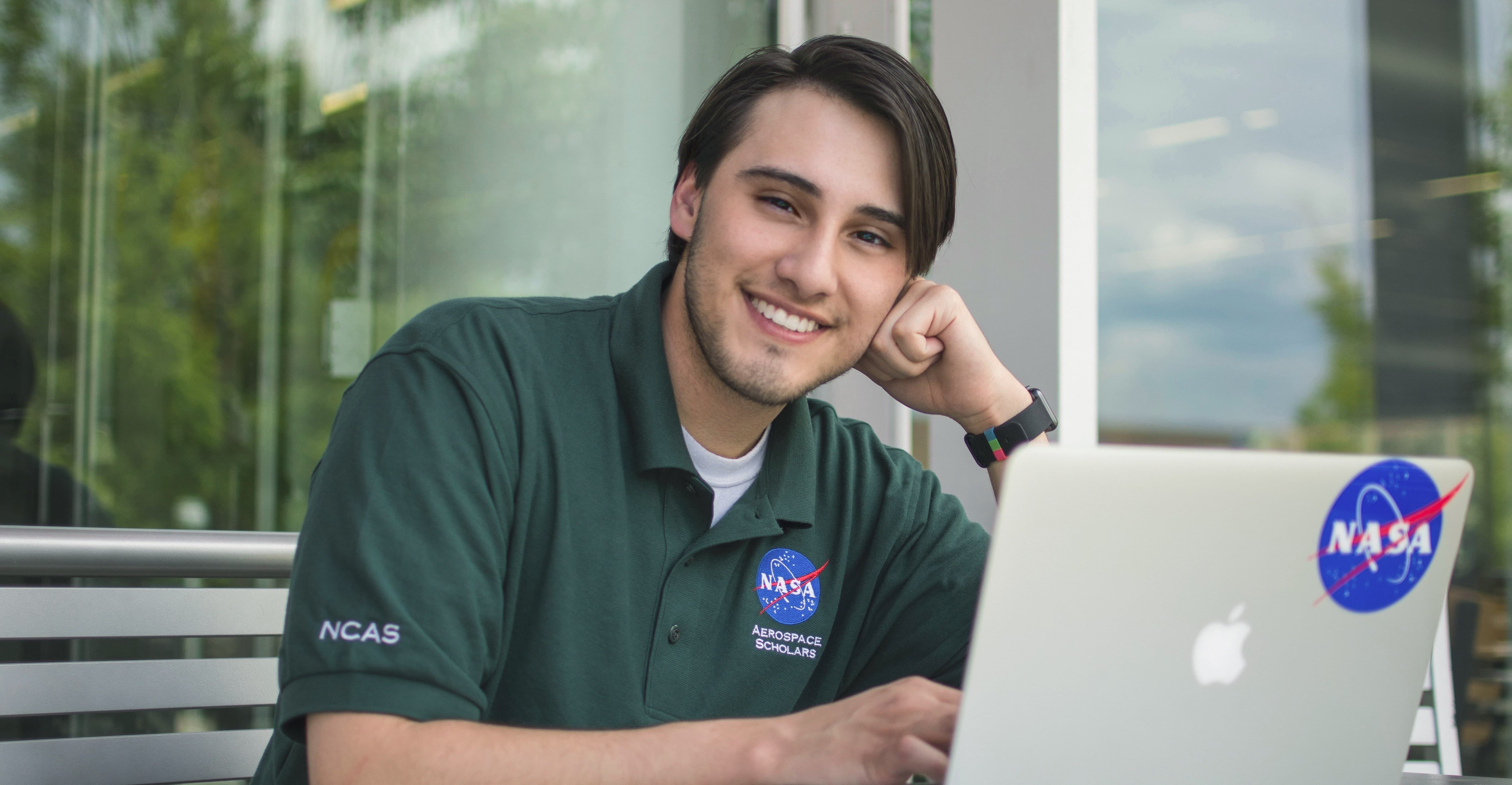 Headshot of Lorenzo wearing a NASA polo